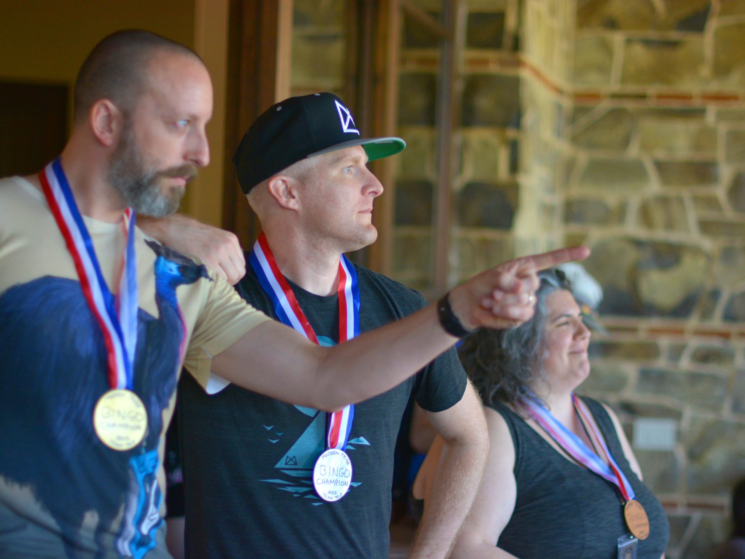 Group wearing medals after winning bingo